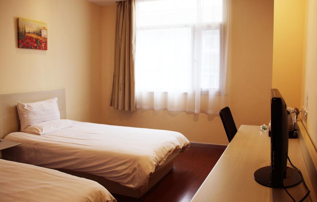Hanting Hotel Ningbo Tian Yi Square Newbranch Værelse billede